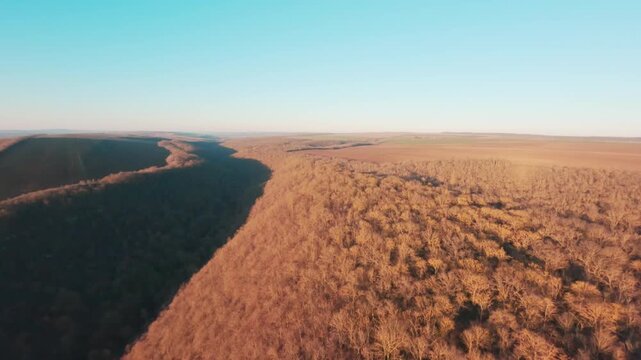 FPV drone aerial shot. Beautiful mountain view of nature landscape in late autumn. Moldova, Europe