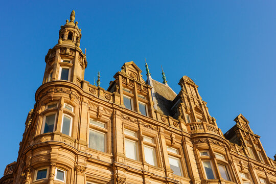 Newcastle upon Tyne UK: 17th Nov 2025: Newcastle Grainger Town showcases historic buildings against a clear blue sky in the late afternoon. The intricate design of the architecture captures attention