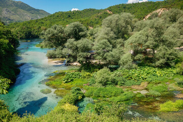Turquoise spring water of Blue Eye Nature Monument near to Saranda, Albania