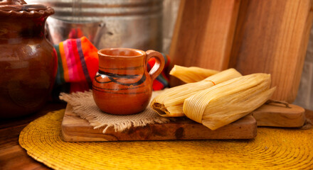Tamales. Traditional dish typical of Mexico and some Latin American countries. Corn dough wrapped in corn leaves. The tamales are steamed.