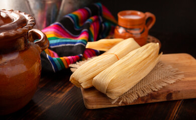 Tamales. Traditional dish typical of Mexico and some Latin American countries. Corn dough wrapped in corn leaves. The tamales are steamed.