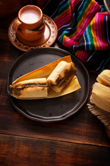 Tamales. Traditional dish typical of Mexico and some Latin American countries. Corn dough wrapped in corn leaves. The tamales are steamed.