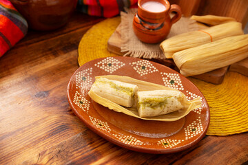 Tamales. Traditional dish typical of Mexico and some Latin American countries. Corn dough wrapped in corn leaves. The tamales are steamed.
