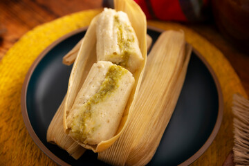 Tamales. Traditional dish typical of Mexico and some Latin American countries. Corn dough wrapped in corn leaves. The tamales are steamed.