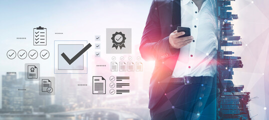 A businessman stands with a smartphone in hand, surrounded by digital icons representing approval and documentation, symbolizing innovation and productivity in the corporate world. Gantry