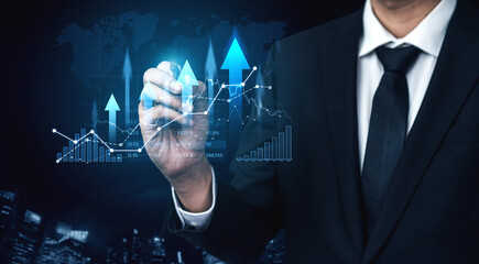 A business professional uses a digital interface to analyze charts and data trends, representing financial growth and strategic planning in modern workplaces. Scalp