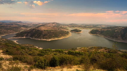 A wonderful view of a lake with a fish farm.
