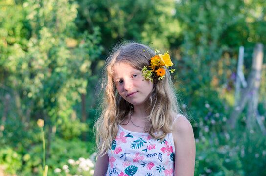 portrait of teenage girl with flowers in hair