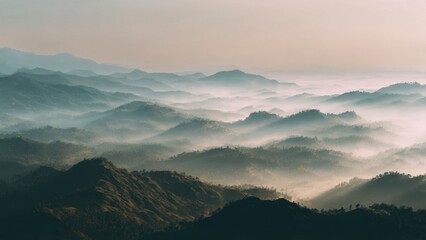 Naklejka premium Misty Mountains Landscape at Sunrise