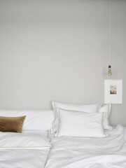 Fototapeta premium Close up of pillows and blanket on the bed
