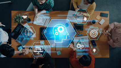 A group of professionals engaged in a brainstorming session, utilizing innovative technology tools...