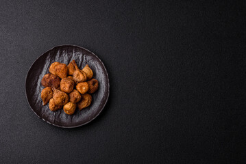 Dried fig are a sweet, healthy fruit for vegans and vegetarians. Dried fig as a food background
