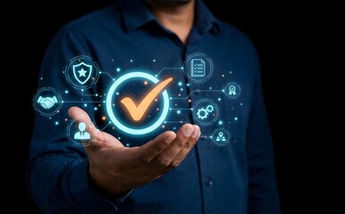 Person's hand is holding up a glowing checkmark icon surrounded by a cluster of related business and security icons.