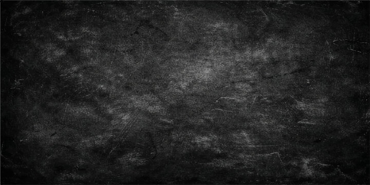 Aged dark grunge background featuring a textured black and white concrete wall with a vintage dirty surface pattern and empty grey paper board design