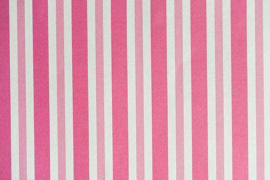 Vibrant Pink and White Vertical Stripe Pattern Seamless Background