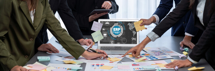 Analyst team use sticky note for creative and analytic brainstorm for business idea with BI data dashboard on laptop screen. Analysis financial data visualization tech for marketing strategy. Prodigy