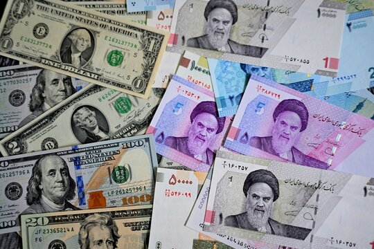 some banknotes from Iran and United States of America