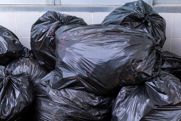 waste, pile of black garbage bags, plastic waste problem and environmental pollution, plastic waste, suitable for recycling and waste management concept