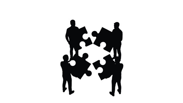 Silhouettes of business people assembling four interlocking puzzle pieces against a white background