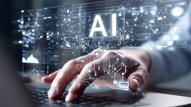 A hand typing on a computer working with the help of artificial intelligence represented by holographic icons and graphics.