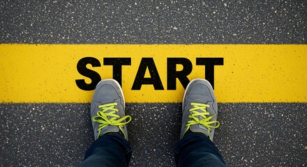 Person standing at start line with yellow laces on gray shoes black