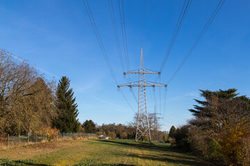High-voltage pylon with cables for power supply.