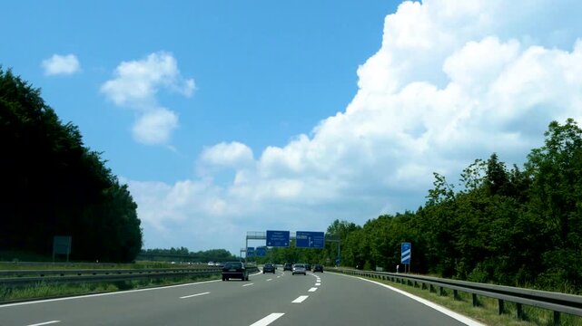 Street view of German autobahn or highway, freeway driving on the A8 in Baden-W&uuml;rttemberg to Stuttgart as time lapse 