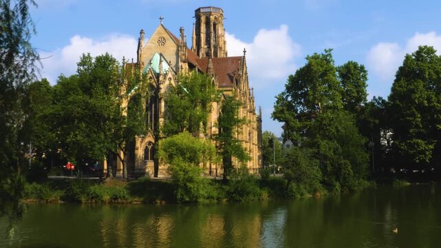 Street view of the Protestant Church of St John (German: Johanneskirche) in Stuttgart . On a sunny day in Spring