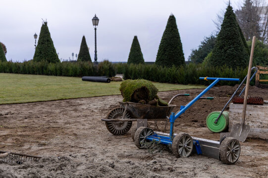 Blue Turf Laying Machine Ready for Grass Carpet Installation