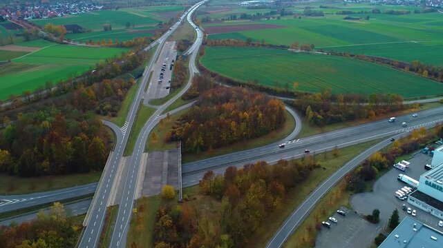 Aerial view time lapse of an autobahn crossing in south Germany ona sunny autumn day.