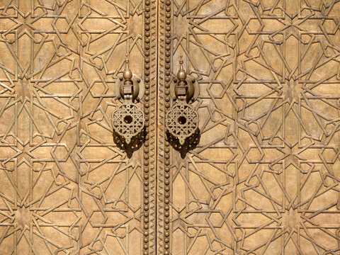 Morocco. Fez. The door ornated brass handles of central entrance of the royal palace founded by the Merinids in 1320