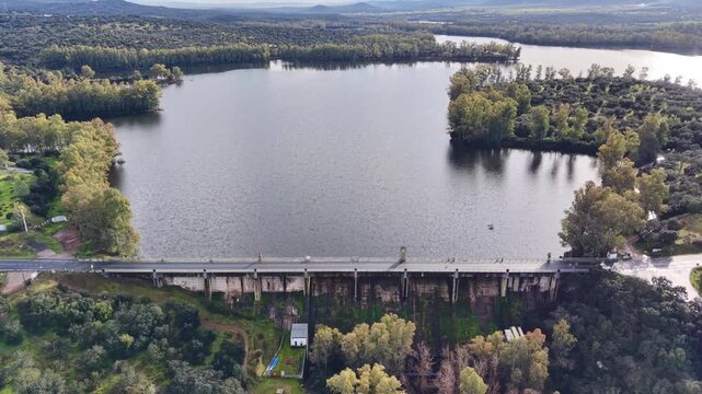 Epic Aerial View of Reservoir and Dam in Serene Landscape