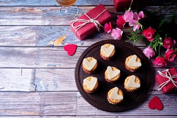 Salami sausage and cheese slices in the form of hearts and crackers for Valentine's day holidays