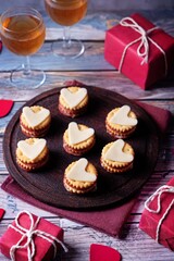Salami sausage and cheese slices in the form of hearts and crackers for Valentine's day holidays