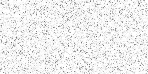 Obraz premium Subtle mosaic pattern of scattered grey and white irregular shapes creating a textured background for design and abstract concepts