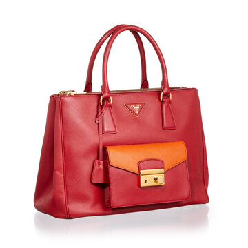 Prada Galleria bag in fiery red and papaya orange Saffiano leather. Milan, Italy, October 3_2025