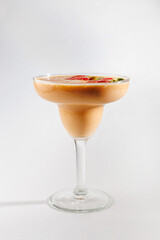 Delicious cocktail served in a glass with fresh fruits and creamy blend enjoyed at a casual gathering or celebration