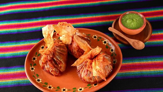 Mexican rustic cuisine with colorful tablecloth background