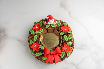 A garland of brownies and cookies with chocolate, decorated with marzipan_top view.