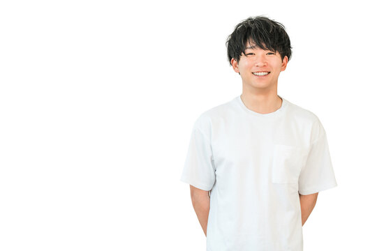 Smiling Asian man in an oversized t-shirt
