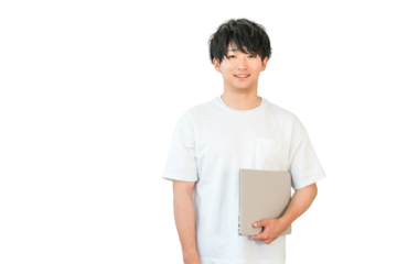 Young Asian man in a T-shirt holding a laptop