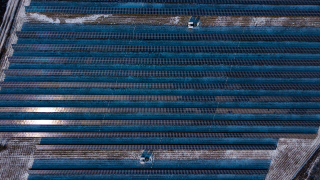Winter aerial view featuring a solar field in Cromwell, Connecticut