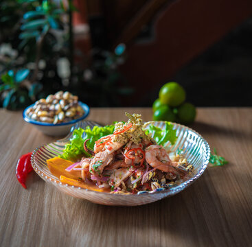 Traditional Peruvian cuisine featuring ceviche made with fresh fish, leche de tigre and causa acevichada served on elegant plates. Fresh seafood dishes representing Peruvian gastronomy, Latin American