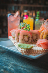 Assorted sushi and maki rolls on wooden table, Japanese food concept © Yuri - Supay 