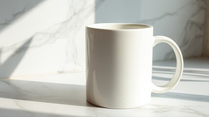 Obraz premium White Mug Mockup on Marble Surface with Sunlight, Ideal for Customizable Designs and Product Presentations