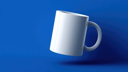 Obraz premium Blank White Mug Mockup on Blue Background - Perfect for Branding and Design Presentation