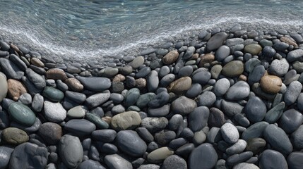 Smooth River Stones in Varying Shades of Grey Along a Gentle Shoreline with Rippling Water