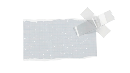 Torn graph paper with speckles taped on a light gray background