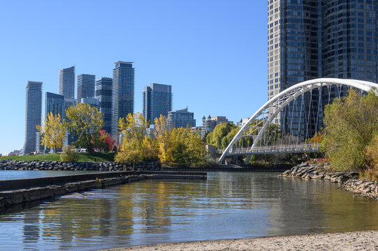 Etobicoke skyline reflecting autumn colors over the Mimico Creek