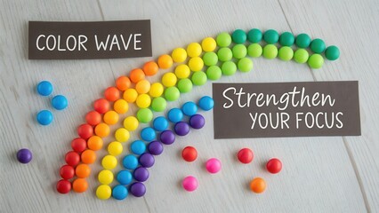Colorful Spheres Forming a Vibrant Rainbow Curve